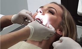 Patient receiving dental treatment