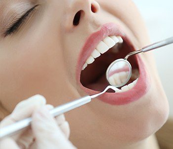 Patient receiving dental treatment