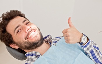 man smiling thumb up 