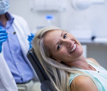 Woman smiling in dental chair