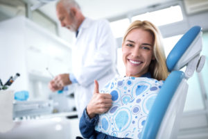 Smiling woman at dentist's office