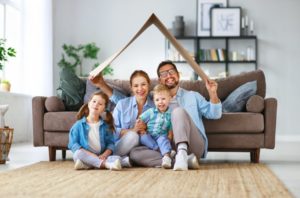 Happy family in quarantine practices healthy habits form Carrollton dentist