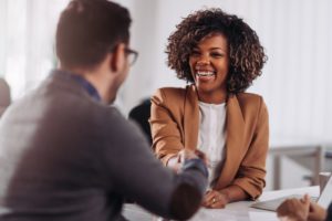 woman smiling after accepting a job in carrollton