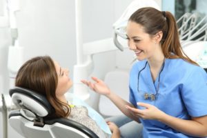 patient talking to their dentist during a cosmetic dental consultation 