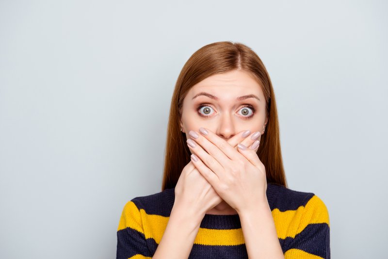 young woman with bad breath 